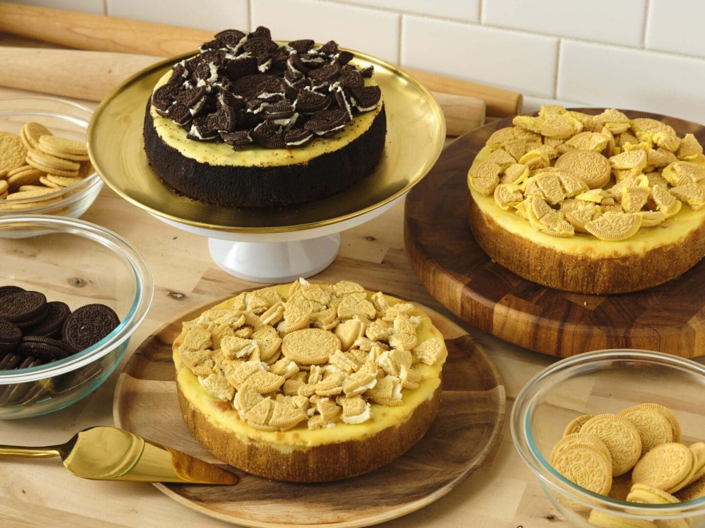 Cheesecakes topped with assorted cookies.