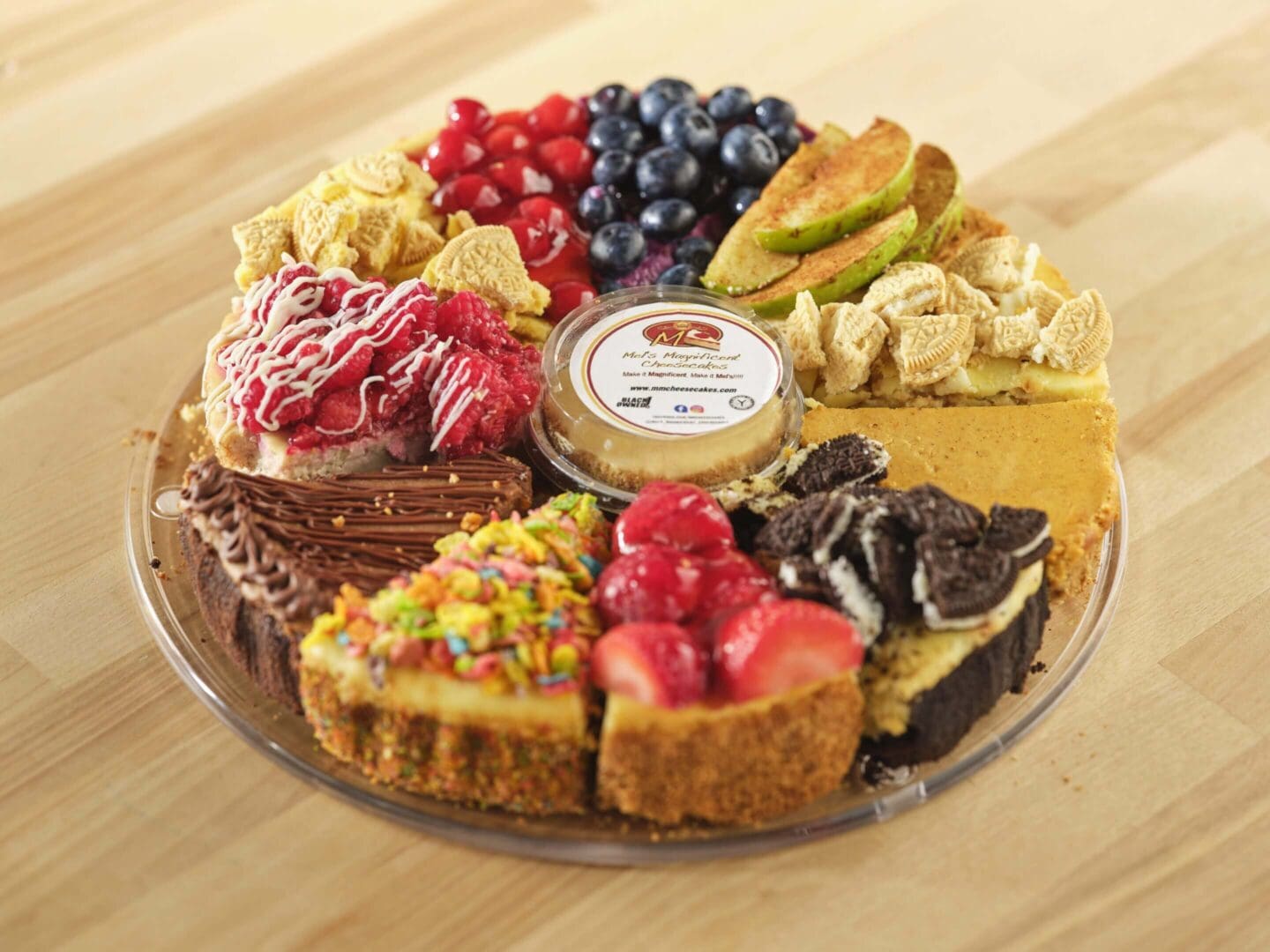 Assorted cheesecake slices with various toppings.